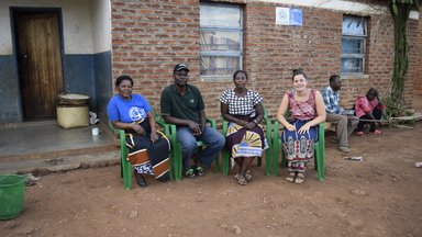 Cameron with members of her community
