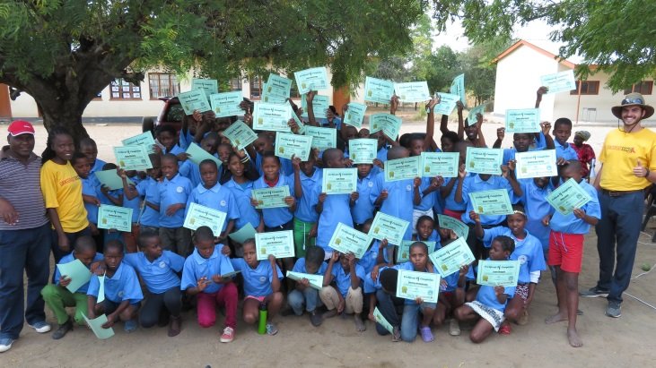 Youth celebrate completing their Grassroot Soccer program