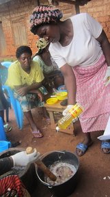Mixing home ingredients to make organic pest repellents.