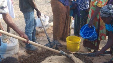Making compost. Photo by Alyssa