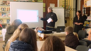 2. Volunteer Albert Sou speaks at a workshop in Costești, urging young men to help prevent gender-based violence.
