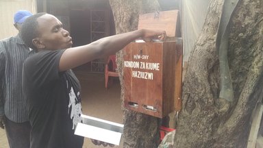 Edwin Filling the Condom Box