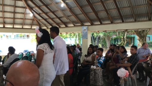 My host family’s sister’s wedding at Camalote, Belize, a small village outside the capital city of Belmopan. The bride is being escorted by her mother. The wedding celebration included the wedding ceremony, dinner, and a dance.