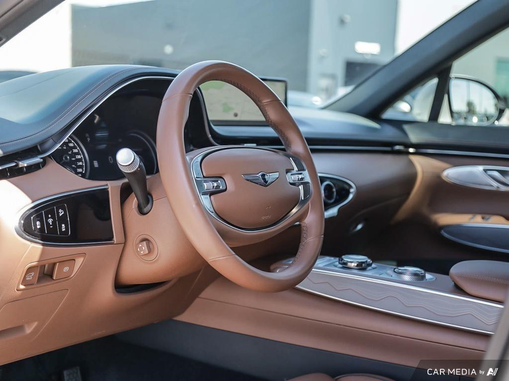 used 2023 Genesis GV70 car, priced at $48,597