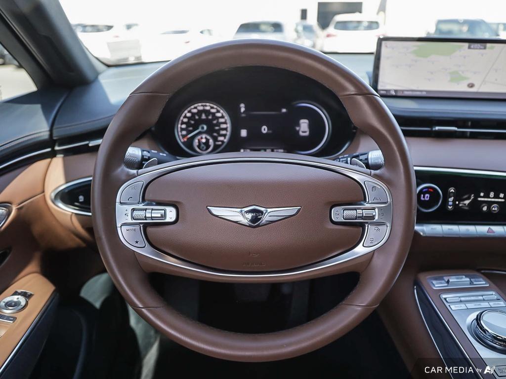 used 2023 Genesis GV70 car, priced at $48,597
