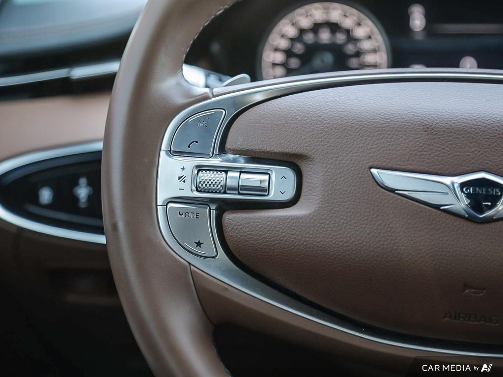 used 2023 Genesis GV70 car, priced at $48,597
