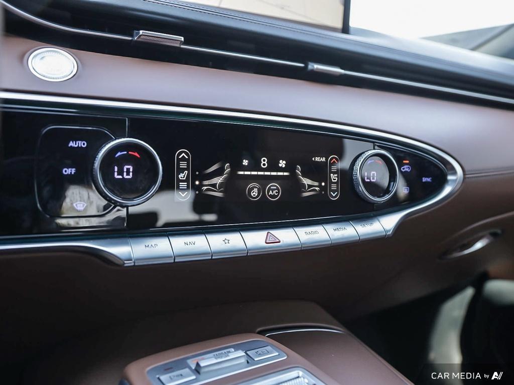 used 2023 Genesis GV70 car, priced at $48,597