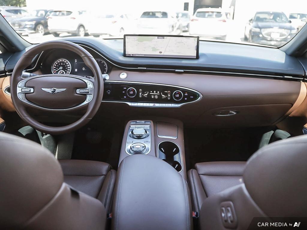 used 2023 Genesis GV70 car, priced at $48,597