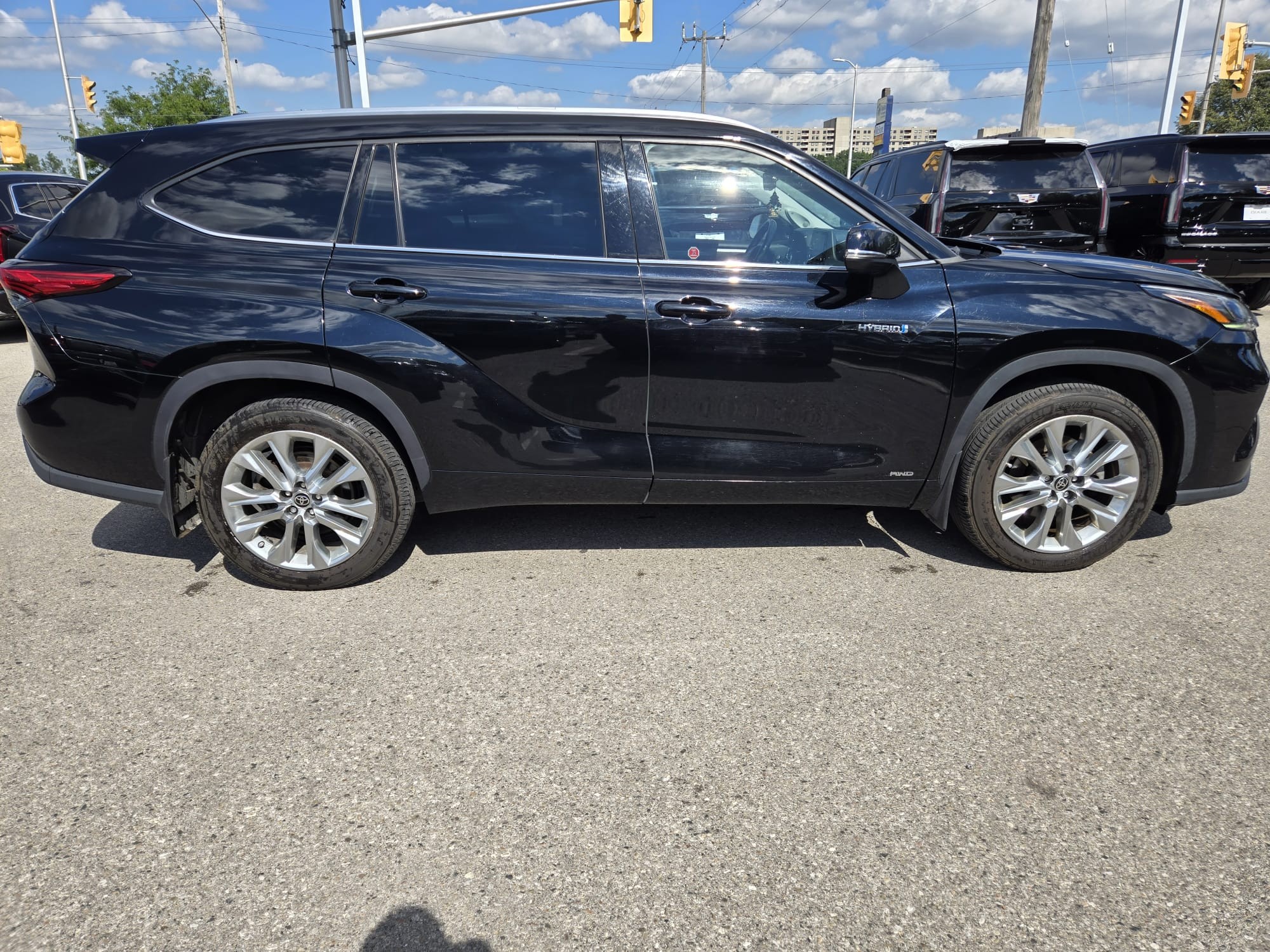 used 2021 Toyota Highlander Hybrid car, priced at $43,593