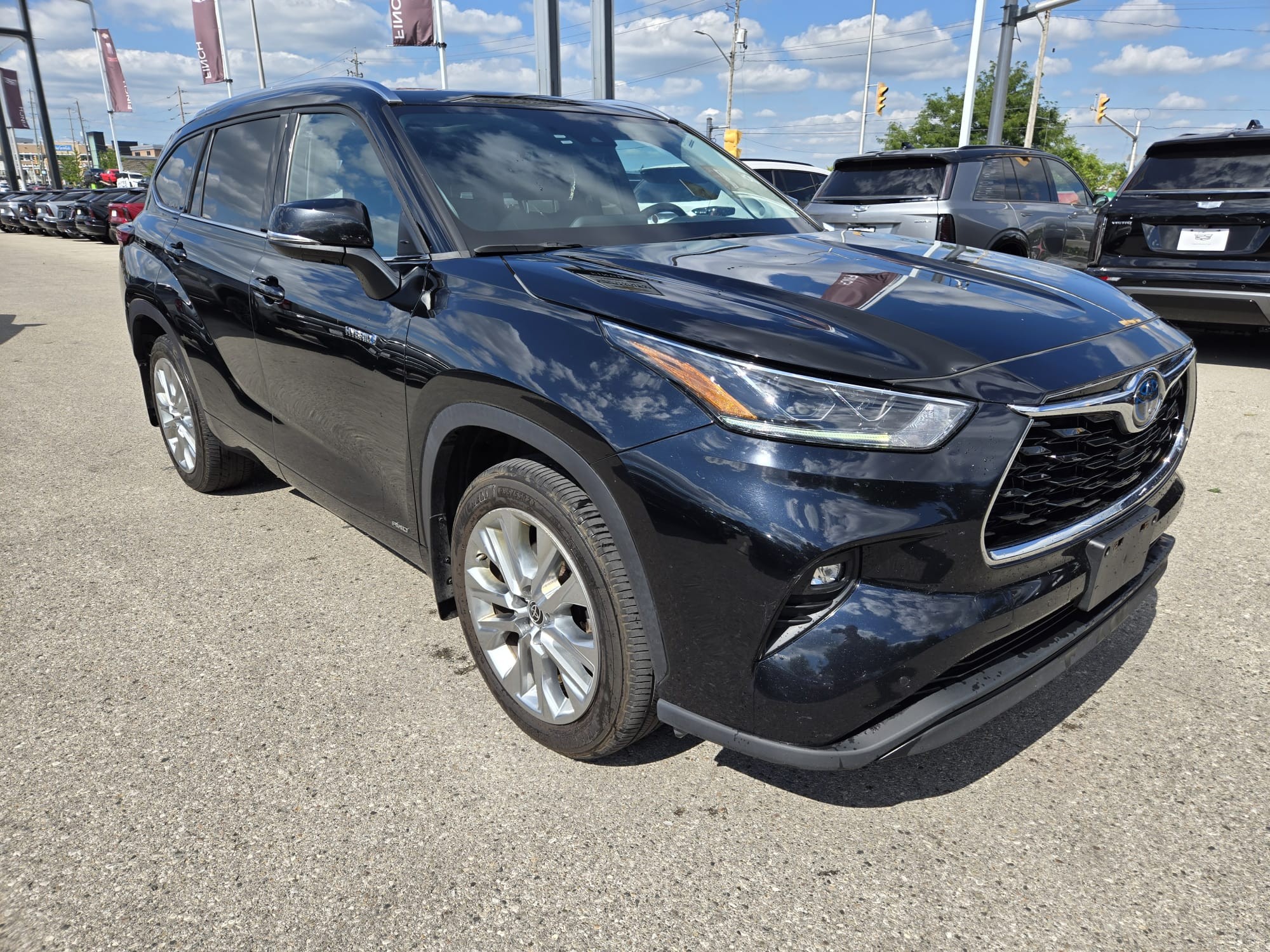 used 2021 Toyota Highlander Hybrid car, priced at $43,593
