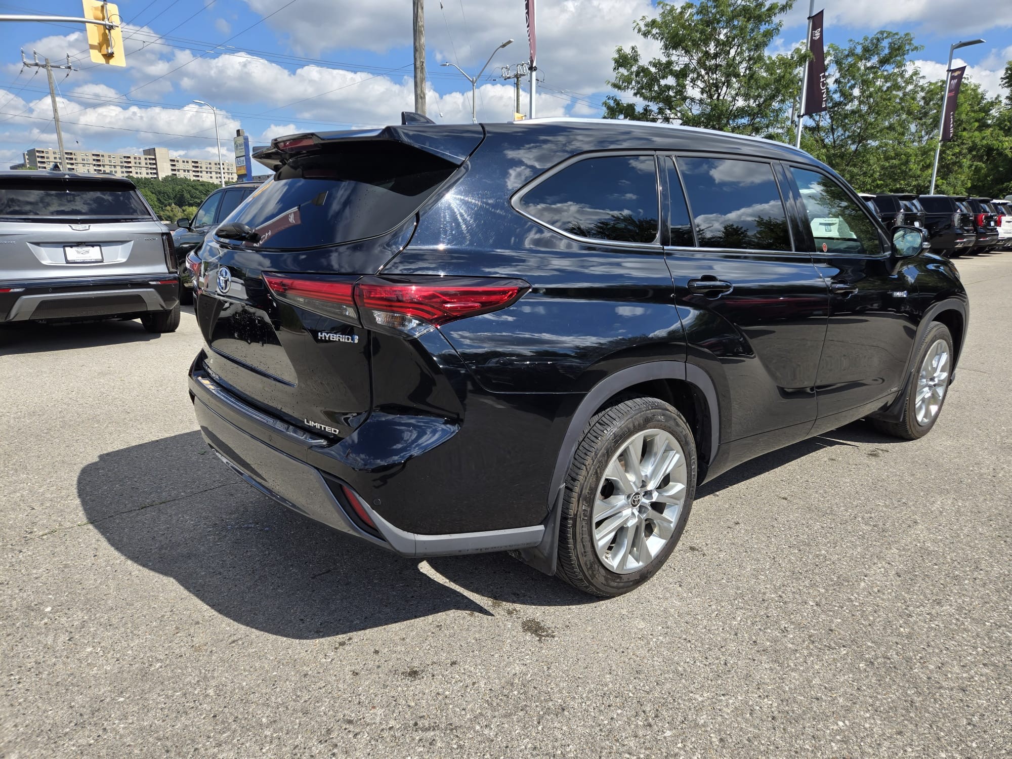 used 2021 Toyota Highlander Hybrid car, priced at $43,593