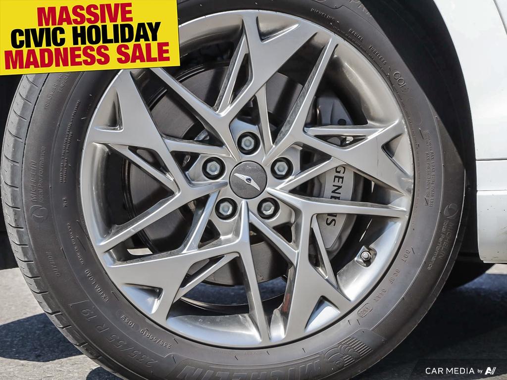used 2023 Genesis GV70 car, priced at $48,597