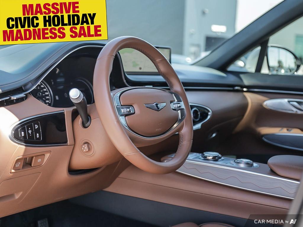 used 2023 Genesis GV70 car, priced at $48,597