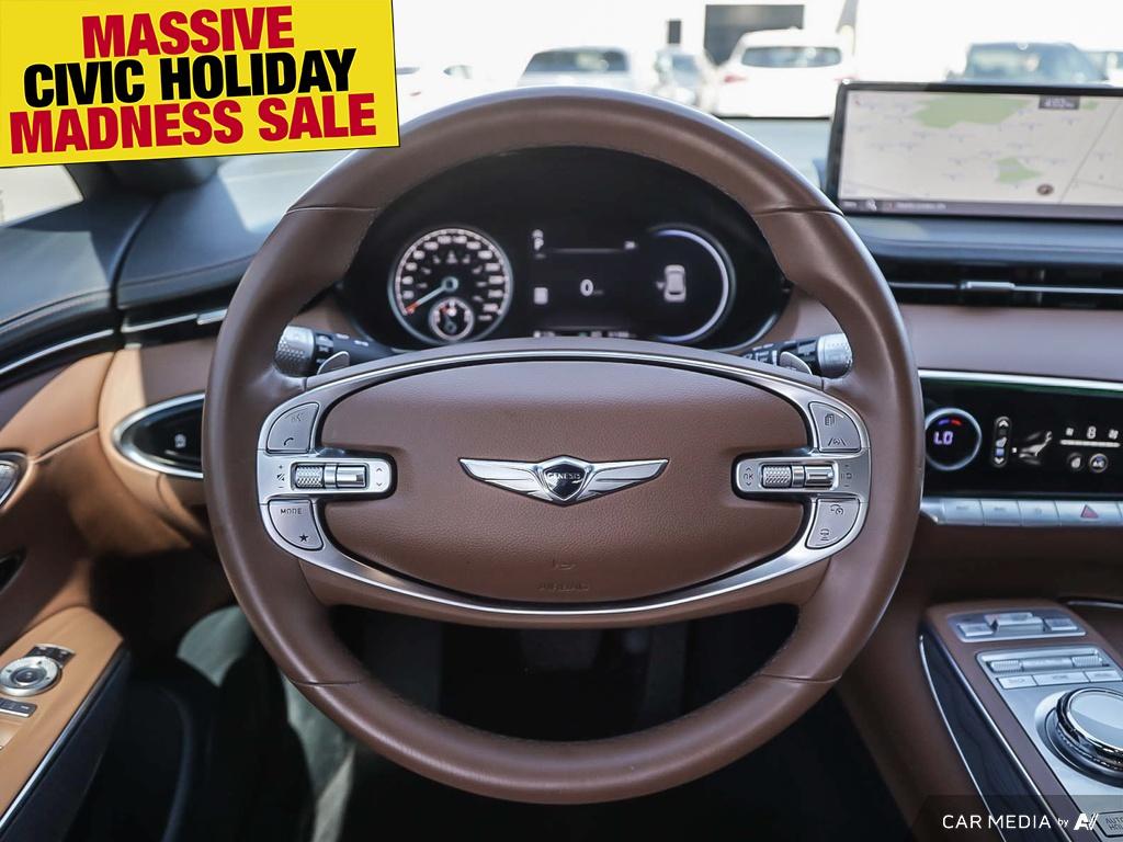 used 2023 Genesis GV70 car, priced at $48,597