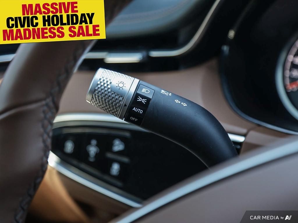 used 2023 Genesis GV70 car, priced at $48,597