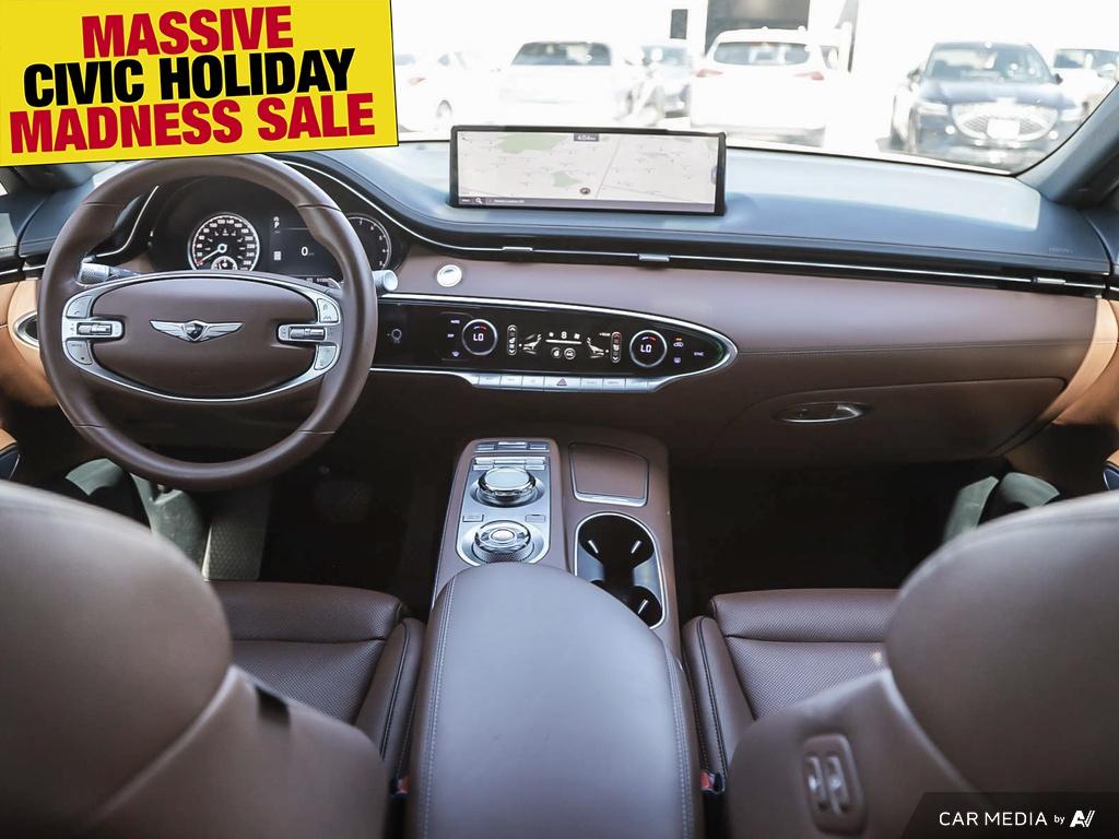 used 2023 Genesis GV70 car, priced at $48,597