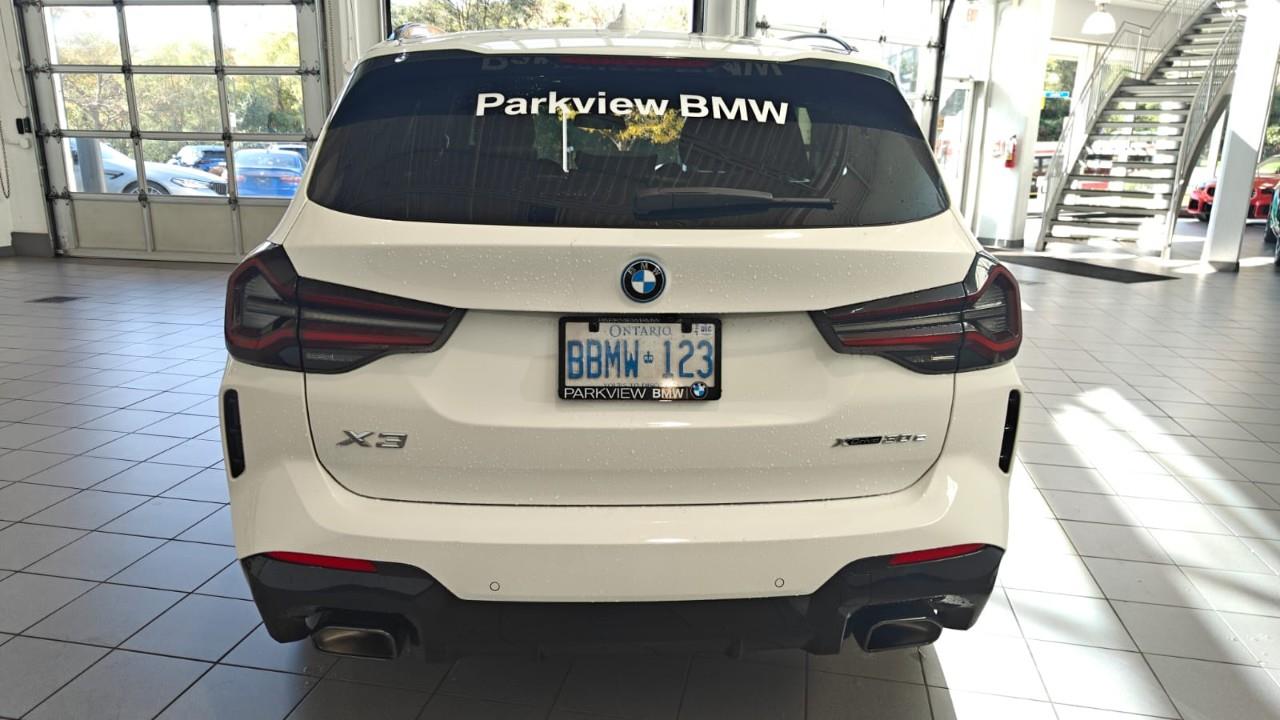 used 2023 BMW X3 PHEV car, priced at $64,367