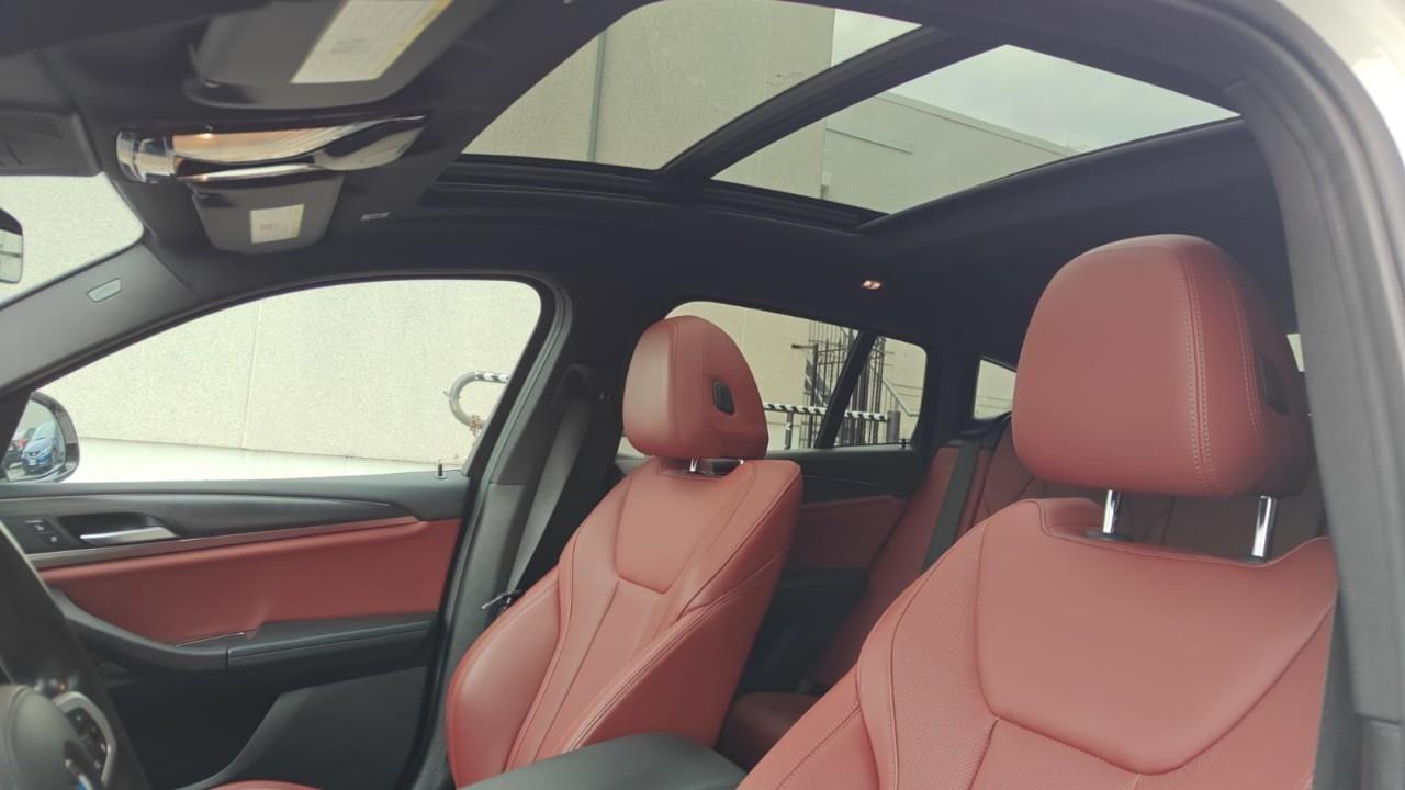 used 2023 BMW X4 car, priced at $55,992