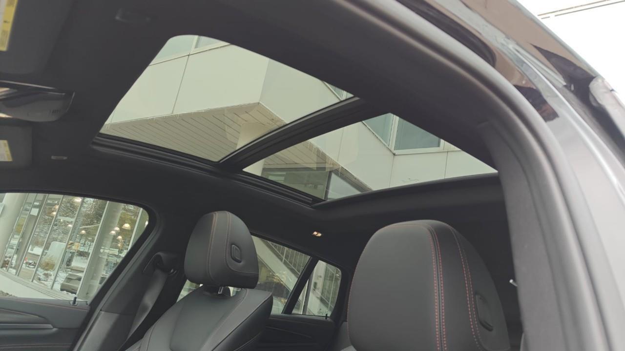 used 2023 BMW X4 car, priced at $69,992